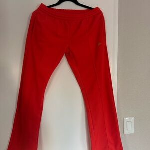 Nike coral track pants, size medium
